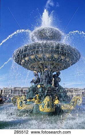 Stock Image - Low angle view of fountain, Place De La Concorde, France . Fotosearch