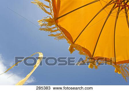 Low angle view of parasol, Bali, Indonesia View Large Photo Image Stock Image - Low angle view of parasol, Bali, Indonesia . Fotosearch