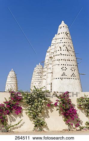 Low angle view of pigeon houses against blue sky, Egypt View Large Photo Image Stock Image - Low angle view of pigeon houses against blue sky, Egypt . Fotosearch