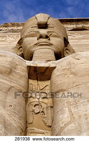 Stock Photo - Low angle view of Ramses II statue, Great Temple of Rameses II, Abu Simbel, Egypt . Fotosearch