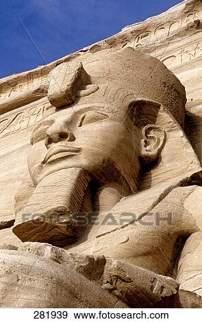Stock Photo - Low angle view of Ramses II statue, Great Temple of Rameses II, Abu Simbel, Egypt . Fotosearch