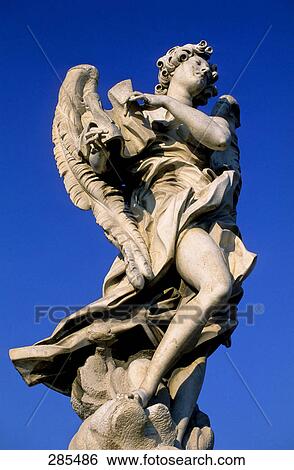 Low angle view of sculpture against blue sky, Rome, Italy View Large Photo Image Stock Photograph - Low angle view of sculpture against blue sky, Rome, Italy . Fotosearch