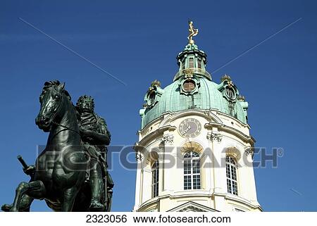 Stock Photograph - Low angle view of sculpture in front of building, Rider Memorial, Charlottenburg Palace, Berlin, Germany . Fotosearch