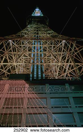 Low angle view of tower lit up at night, Tokyo Prefecture, Japan View Large Photo Image Stock Image - Low angle view of tower lit up at night, Tokyo Prefecture, Japan . Fotosearch
