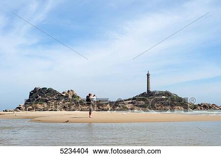 Man at beach, Mui Ne, Vietnam, Asia View Large Photo Image Picture - Man at beach, Mui Ne, Vietnam, Asia . Fotosearch