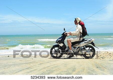 Man at beach, Mui Ne, Vietnam, Asia View Large Photo Image Stock Image - Man at beach, Mui Ne, Vietnam, Asia . Fotosearch
