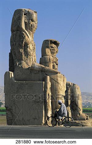 Man cycling beside Egyptian sculptures, Temple Of Luxor, Luxor, Egypt View Large Photo Image Stock Image - Man cycling beside Egyptian sculptures, Temple Of Luxor, Luxor, Egypt . Fotosearch