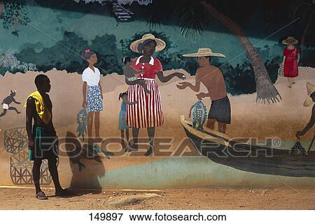 Man looking at mural, Praslin Island, Seychelles View Large Photo Image Stock Photo - Man looking at mural, Praslin Island, Seychelles . Fotosearch