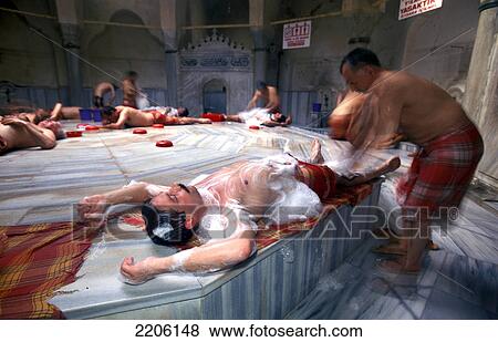 Men laying and getting soaped in Turkish Bath, Istanbul, Turkey View Large Photo Image Stock Photo - Men laying and getting soaped in Turkish Bath, Istanbul, Turkey . Fotosearch
