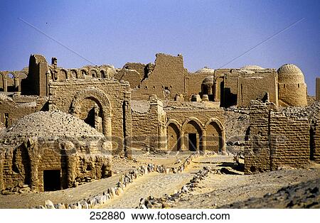 Stock Image - Mud houses in desert, Kharga Oasis, Libyan Desert, Egypt . Fotosearch