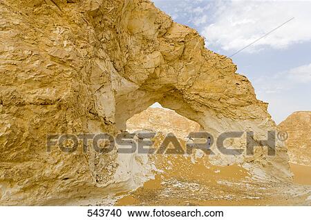 Natural arch in arid landscape, Farafra Oasis, Libyan Desert, Egypt View Large Photo Image Stock Image - Natural arch in arid landscape, Farafra Oasis, Libyan Desert, Egypt . Fotosearch