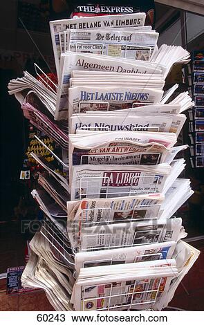 Stock Image - Newspapers on rack, Spain, Europe . Fotosearch