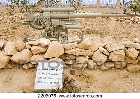 Stock Photography - Old German cannon displayed at memorial, El Alamein, Egypt . Fotosearch