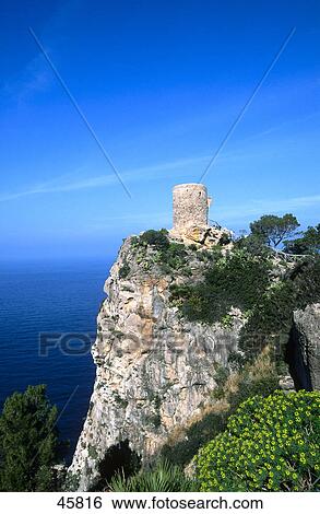 Stock Photograph - Old ruins of tower, Punta d es Verger, Mallorca, Baleares, Spain . Fotosearch