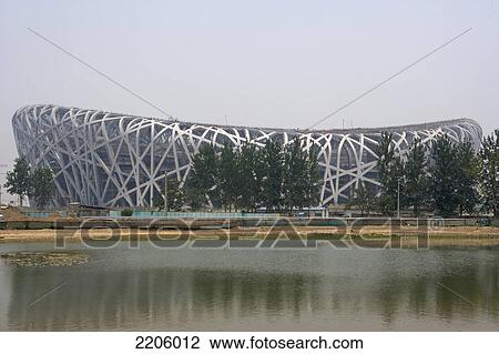 Olympic stadium at waterfront, The Bird's Nest, Beijing, China View Large Photo Image Stock Image - Olympic stadium at waterfront, The Bird's Nest, Beijing, China . Fotosearch