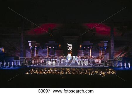 Opera artists performing on stage, Opera Aida, Verona, Italy View Large Photo Image Stock Photo - Opera artists performing on stage, Opera Aida, Verona, Italy . Fotosearch