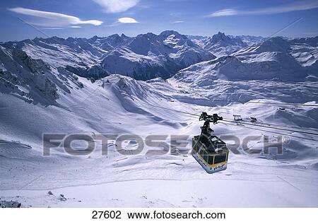 Overhead cable car in mountain range, Valluga Bahn, Galzig, Sankt Anton am Arlberg, Tyrol, Austria View Large Photo Image Stock Image - Overhead cable car in mountain range, Valluga Bahn, Galzig, Sankt Anton am Arlberg, Tyrol, Austria . Fotosearch