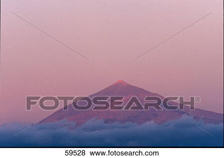 Panoramic view of mountain peak, Tenerife, La Gomera, Canary Islands, Spain View Large Photo Image Stock Photo - Panoramic view of mountain peak, Tenerife, La Gomera, Canary Islands, Spain . Fotosearch
