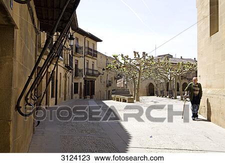 Pedestrian in an alley, Elciego, Spain View Large Photo Image Stock Image - Pedestrian in an alley, Elciego, Spain . Fotosearch