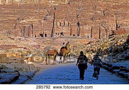 People and camels in front of ruins of building, Jordan View Large Photo Image Stock Image - People and camels in front of ruins of building, Jordan . Fotosearch