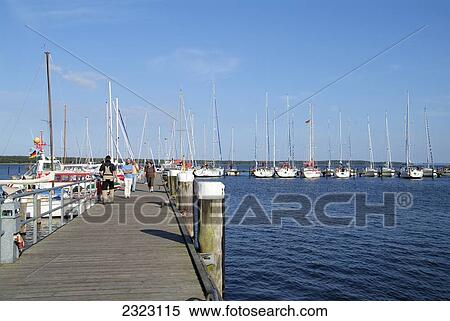 Stock Photography - People on pier, Ruegen, Mecklenburg-Western Pomerania, Germany . Fotosearch