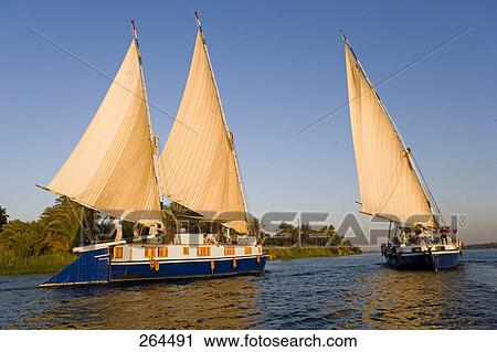 People on sailboats in river, Nile River, Egypt View Large Photo Image Stock Image - People on sailboats in river, Nile River, Egypt . Fotosearch