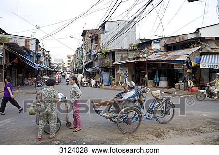 People on the street in Ho Chi Minh City, Vietnam View Large Photo Image Stock Photo - People on the street in Ho Chi Minh City, Vietnam . Fotosearch