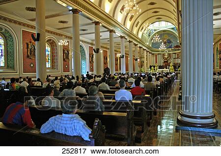 People sitting in cathedral, Costa Rica View Large Photo Image Stock Photo - People sitting in cathedral, Costa Rica . Fotosearch