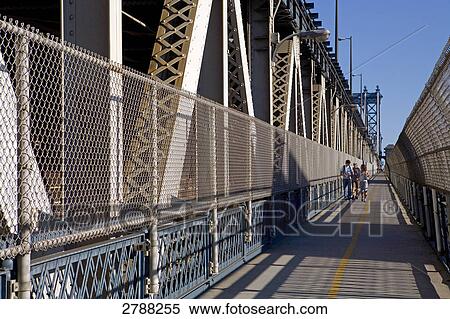 People walking on bridge, Brooklyn Bridge, Manhattan, New York City, New York State, USA View Large Photo Image Stock Photography - People walking on bridge, Brooklyn Bridge, Manhattan, New York City, New York State, USA . Fotosearch