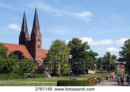 People walking on pavement, Neuruppin, Brandenburg, Germany View Large Photo Image Stock Photo - People walking on pavement, Neuruppin, Brandenburg, Germany . Fotosearch