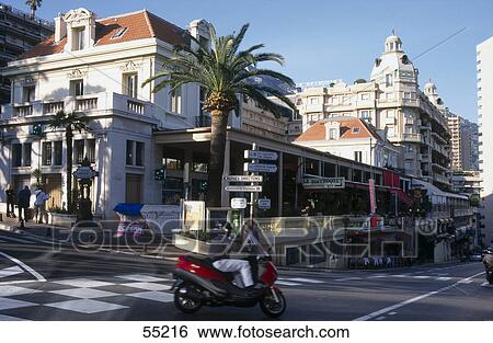 Person driving motor scooter on road, Monte Carlo, Monaco View Large Photo Image Stock Photograph - Person driving motor scooter on road, Monte Carlo, Monaco . Fotosearch