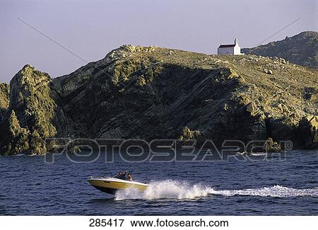 Person driving motorboat in sea View Large Photo Image Stock Photo - Person driving motorboat in sea . Fotosearch