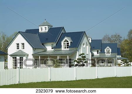 Picket fence in front of holiday resort, Schwielowsee, Brandenburg, Germany View Large Photo Image Stock Photo - Picket fence in front of holiday resort, Schwielowsee, Brandenburg, Germany . Fotosearch