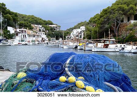 Port of Cala Figuera, fishing net in the foreground, Majorca, Spain View Large Photo Image Stock Image - Port of Cala Figuera, fishing net in the foreground, Majorca, Spain . Fotosearch
