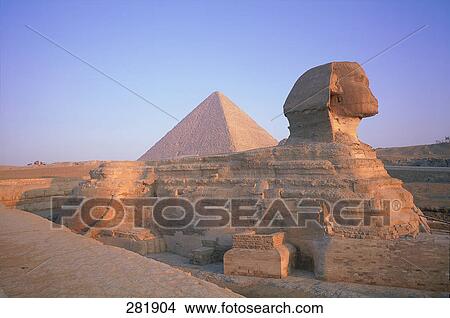 Pyramid in desert against clear blue sky, The Sphinx, Giza, Cairo, Egypt View Large Photo Image Picture - Pyramid in desert against clear blue sky, The Sphinx, Giza, Cairo, Egypt . Fotosearch