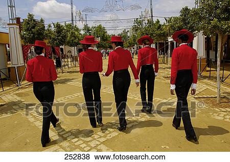 Rear view of five women in traditional clothing, Jerez De La Frontera, Cadiz, Andalusia, Spain View Large Photo Image Stock Photo - Rear view of five women in traditional clothing, Jerez De La Frontera, Cadiz, Andalusia, Spain . Fotosearch