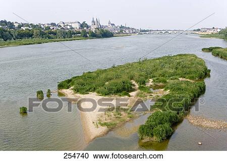 Stock Image - River flowing in front of castle, Chateau De Blois, Loir-Et-Cher, France . Fotosearch