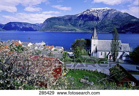 River flowing in front of town, Hordaland, Norway View Large Photo Image Stock Photo - River flowing in front of town, Hordaland, Norway . Fotosearch