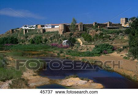 River flowing near village, Rio Tinto River, Andalusia, Spain View Large Photo Image Stock Photo - River flowing near village, Rio Tinto River, Andalusia, Spain . Fotosearch
