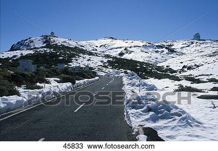 Road passing through snow covered landscape, Roque de los Muchachos Observatory, La Palma, Canary Islands, Spain View Large Photo Image Stock Image - Road passing through snow covered landscape, Roque de los Muchachos Observatory, La Palma, Canary Islands, Spain . Fotosearch