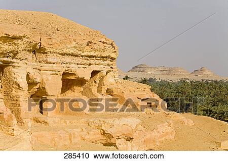 Rock formation in arid landscape, Sahara Desert, Siwa Oasis, Libyan Desert, Egypt View Large Photo Image Stock Image - Rock formation in arid landscape, Sahara Desert, Siwa Oasis, Libyan Desert, Egypt . Fotosearch