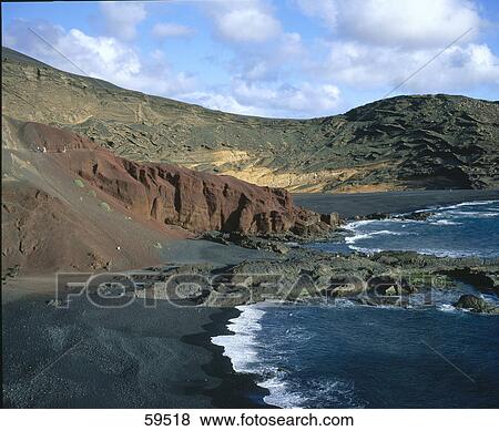 Rock formation on the coast, El Golfo, Lanzarote, Canary Islands, Spain View Large Photo Image Stock Photo - Rock formation on the coast, El Golfo, Lanzarote, Canary Islands, Spain . Fotosearch