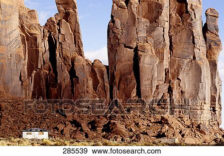 Stock Photo - Rock formations at arid landscape, Monument Valley, Utah, USA . Fotosearch