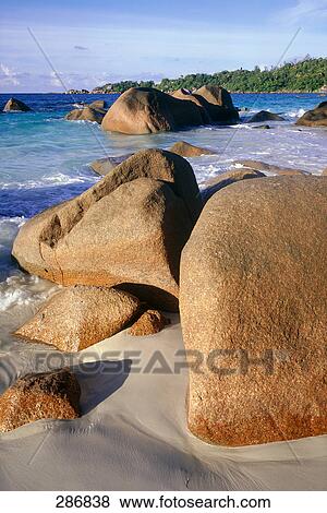 Rock formations at beach, Saint Pierre Islet, Praslin Island, Seychelles View Large Photo Image Stock Photo - Rock formations at beach, Saint Pierre Islet, Praslin Island, Seychelles . Fotosearch