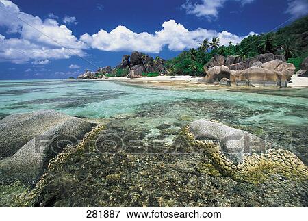 Rock formations at coast View Large Photo Image Stock Photo - Rock formations at coast . Fotosearch
