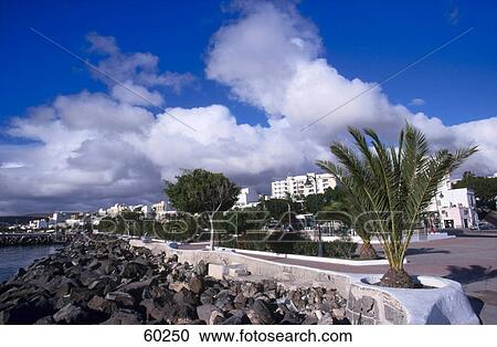 Rocks on the coast of a city, Puerto del rosario, Fuerteventura, Canary Islands, Spain View Large Photo Image Stock Image - Rocks on the coast of a city, Puerto del rosario, Fuerteventura, Canary Islands, Spain . Fotosearch