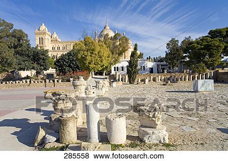 Ruins on landscape with cathedral in background, The Saint-Louis Cathedral, Tunisia View Large Photo Image Stock Photo - Ruins on landscape with cathedral in background, The Saint-Louis Cathedral, Tunisia . Fotosearch