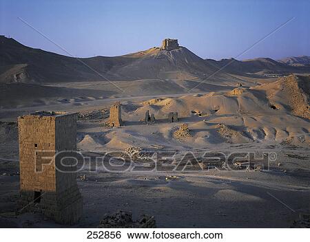 Sand dunes and structures in desert View Large Photo Image Stock Photograph - Sand dunes and structures in desert . Fotosearch