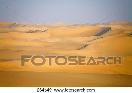 Sand dunes in desert, Great Sand Sea, Siwa Oasis, Libyan Desert, Egypt View Large Photo Image Stock Photo - Sand dunes in desert, Great Sand Sea, Siwa Oasis, Libyan Desert, Egypt . Fotosearch