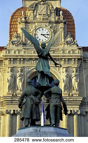 Sculpture in front of clock tower, Cote d'Azur, France View Large Photo Image Stock Photo - Sculpture in front of clock tower, Cote d'Azur, France . Fotosearch